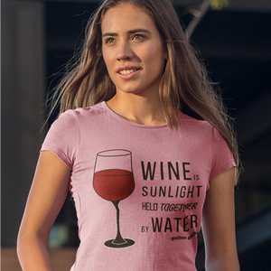 Wine is sunlight held together by water Women's T-Shirt - Cabo Easy